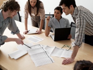 conference room showing people collaborating