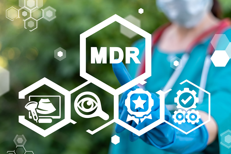 Graphic illustrating our article on EU MDR and how the recent update affects medical device translations. Doctor with stethoscope and MDR text.