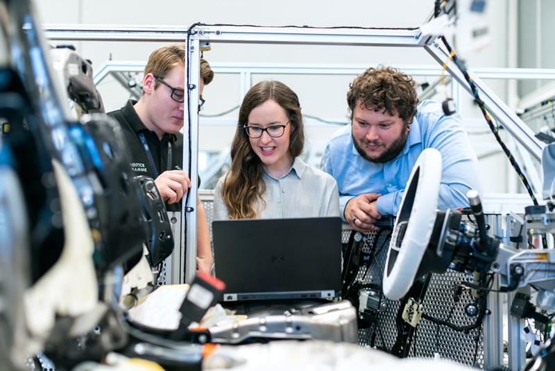 Group of engineers working in a manufacturing facility